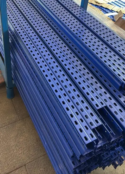 A stack of blue perforated uprights.